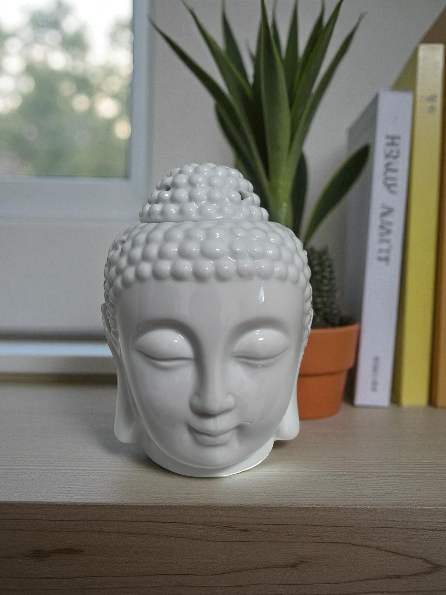 “Buddha Wax Melt Warmer”/ Quemador de cera en forma de Buddha.
