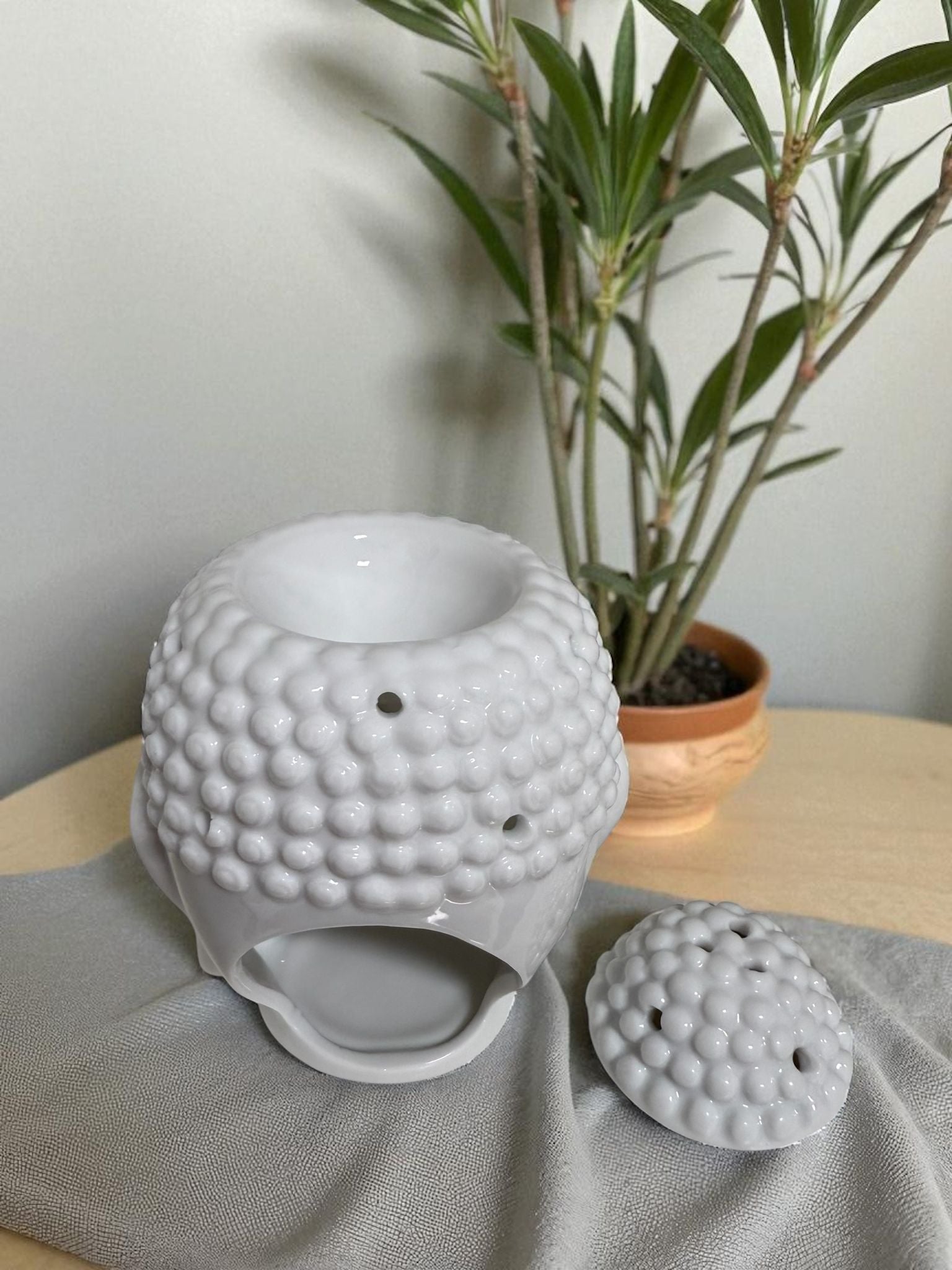 “Buddha Wax Melt Warmer”/ Quemador de cera en forma de Buddha.